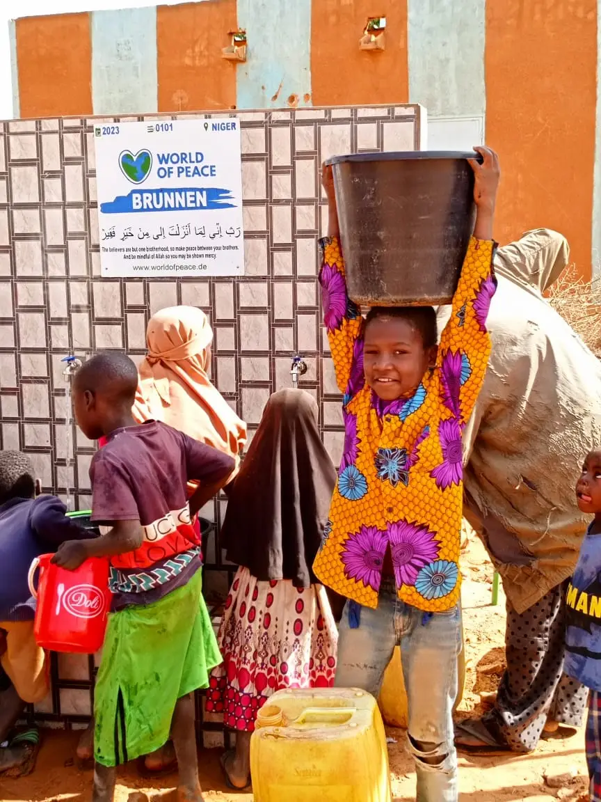 World of Peace well - Community at the well